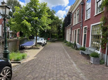 City street with beautiful buildings and canal