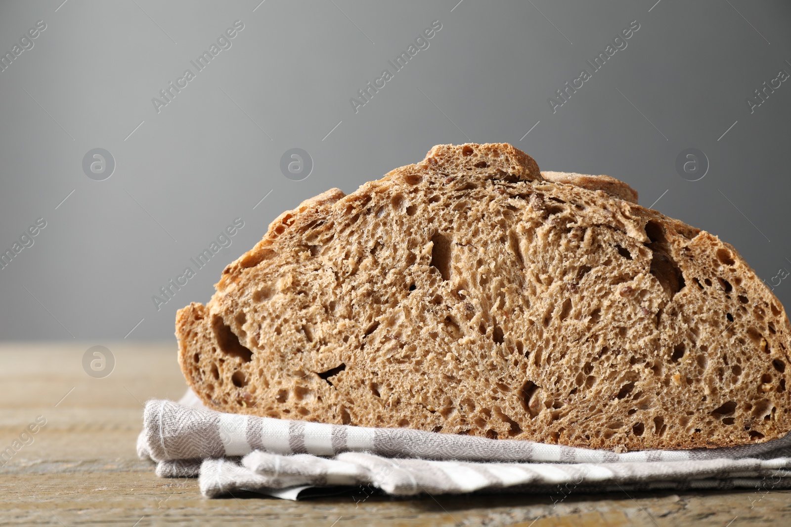 Photo of Freshly baked sourdough bread on wooden table