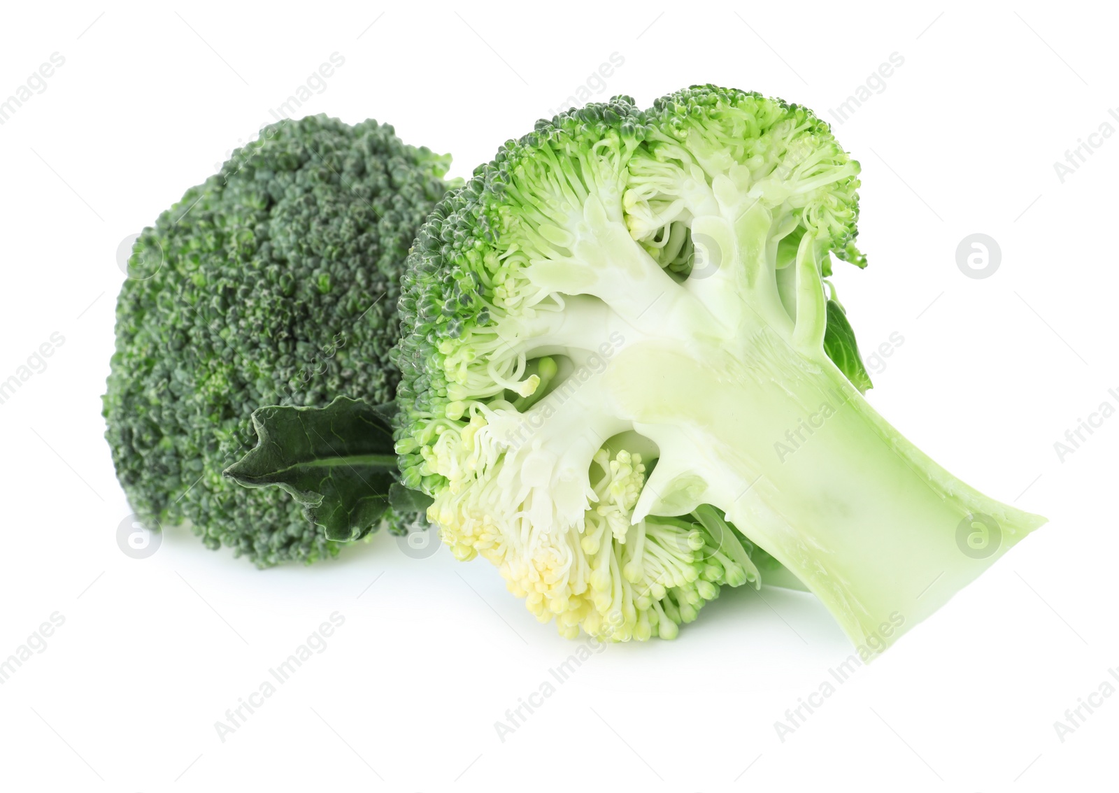 Photo of Fresh green broccoli isolated on white. Organic food