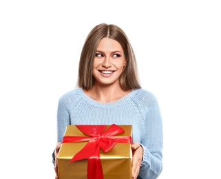 Photo of Young woman with Christmas gift on white background