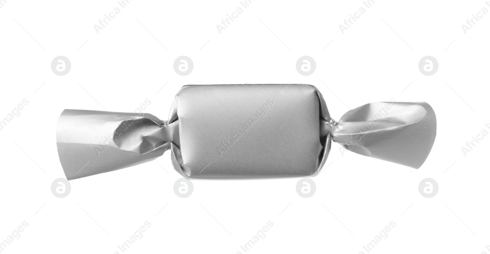 Photo of Delicious candy in silver wrapper isolated on white