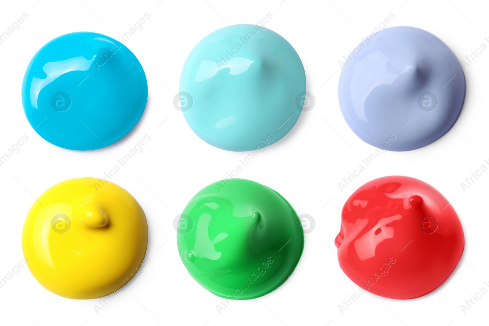 Image of Paint blobs of different colors on white background, top view