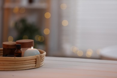 Photo of Beautiful composition with different spa products on white wooden table indoors, space for text