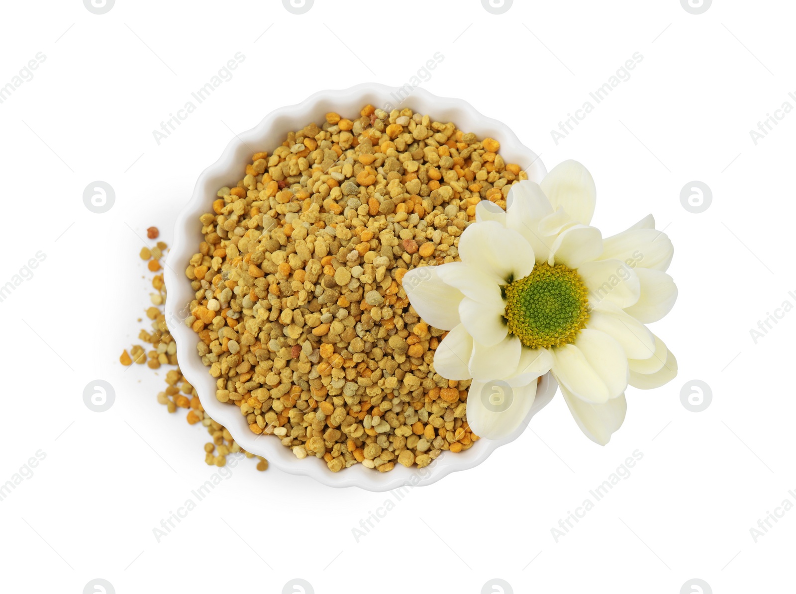 Photo of Fresh bee pollen granules in bowl and flower isolated on white, top view