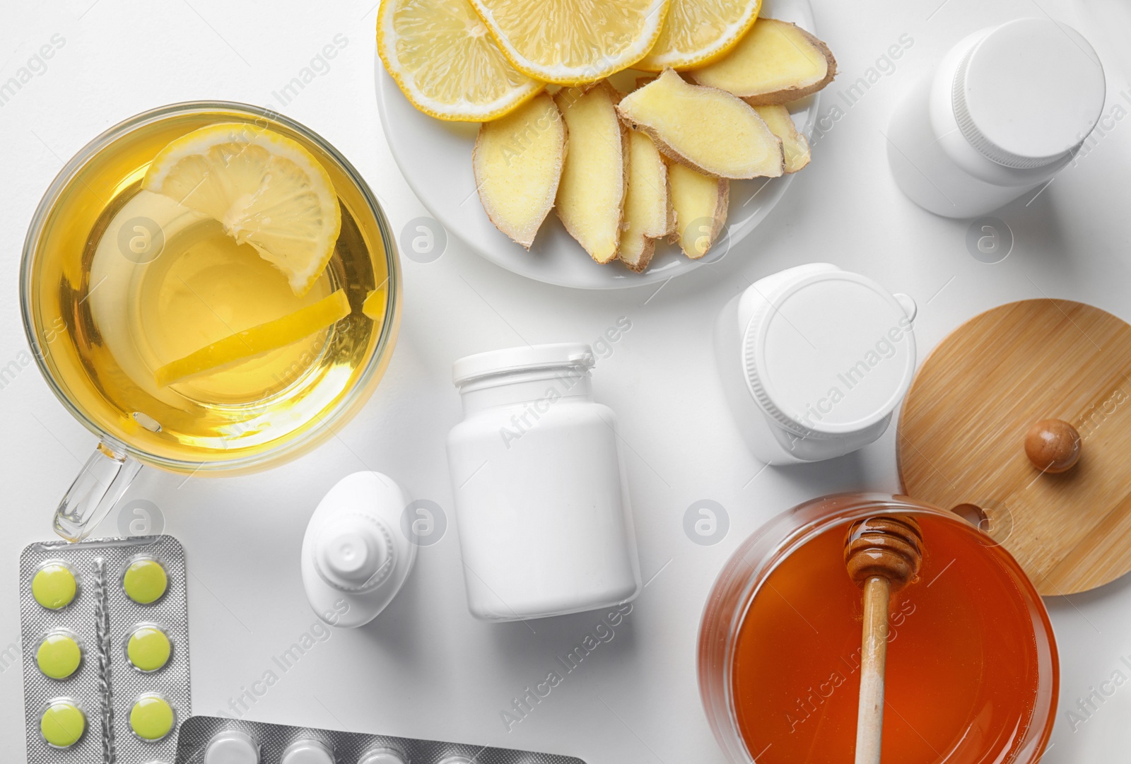 Photo of Flat lay composition with different cold remedies on white table
