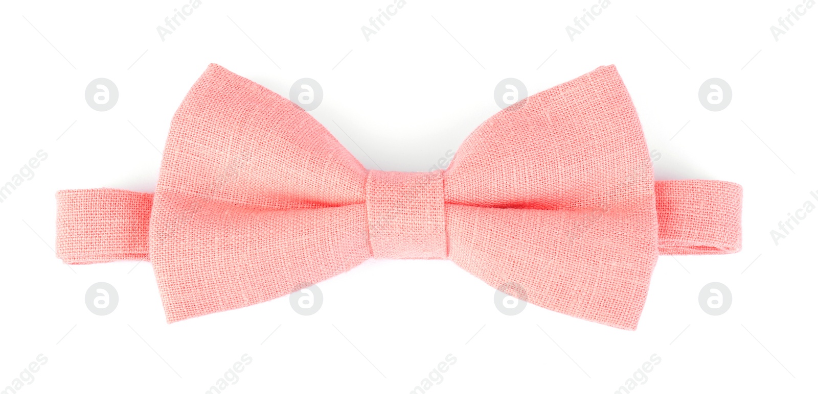 Photo of Stylish pink bow tie isolated on white, top view