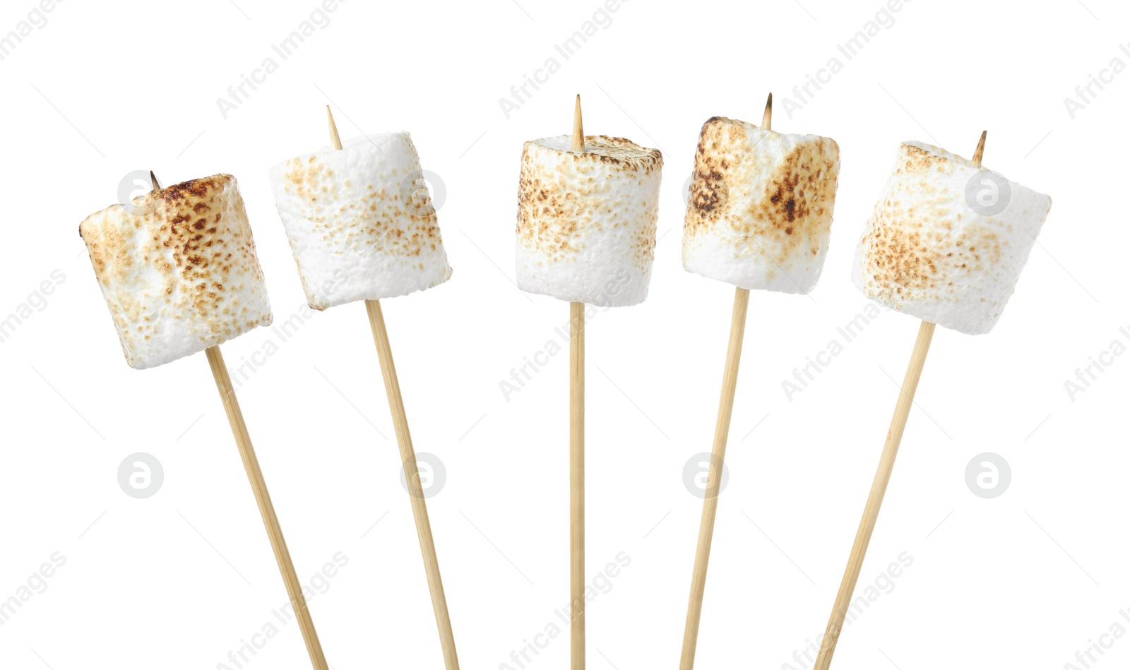Photo of Sticks with roasted marshmallows on white background