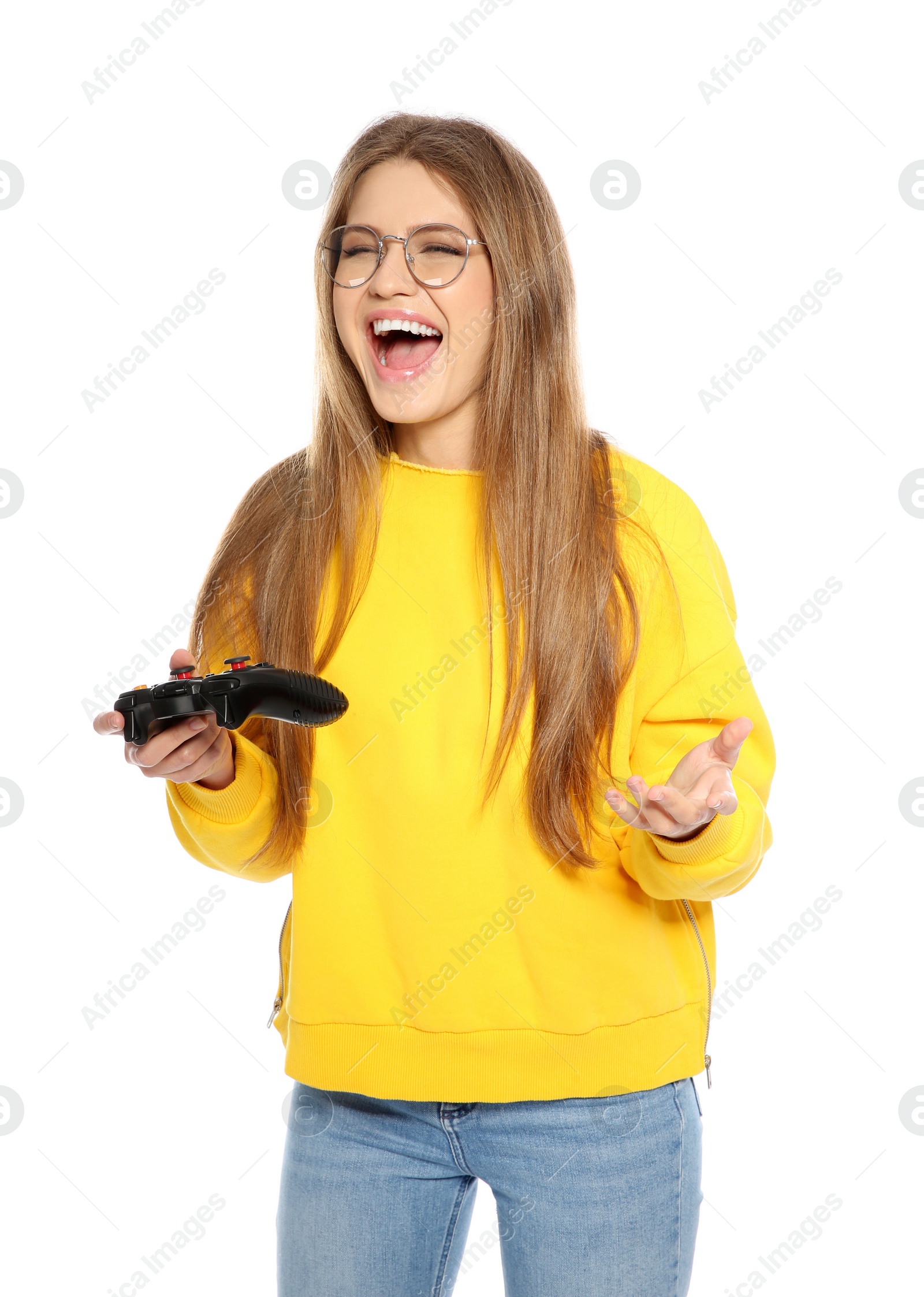 Photo of Emotional young woman playing video games with controller isolated on white