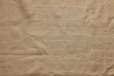 Photo of Texture of burlap fabric as background, top view