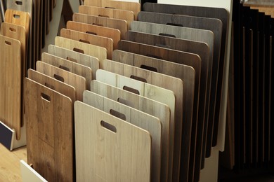 Photo of Many different samples of wooden flooring in store