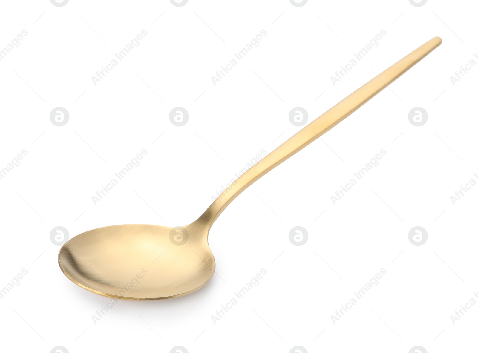 Photo of One shiny golden spoon isolated on white