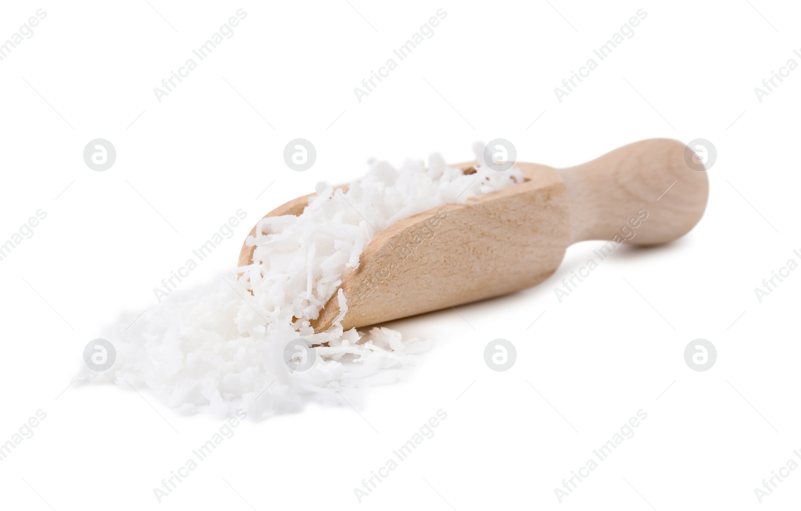 Photo of Coconut flakes in wooden scoop isolated on white