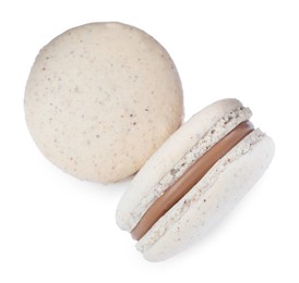 Photo of Delicious beige macarons on white background, top view