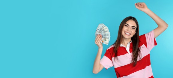 Young woman with money on turquoise background, space for text. Banner design