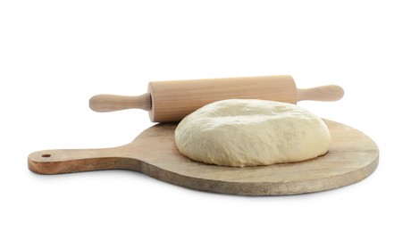Photo of Fresh yeast dough and wooden rolling pin isolated on white