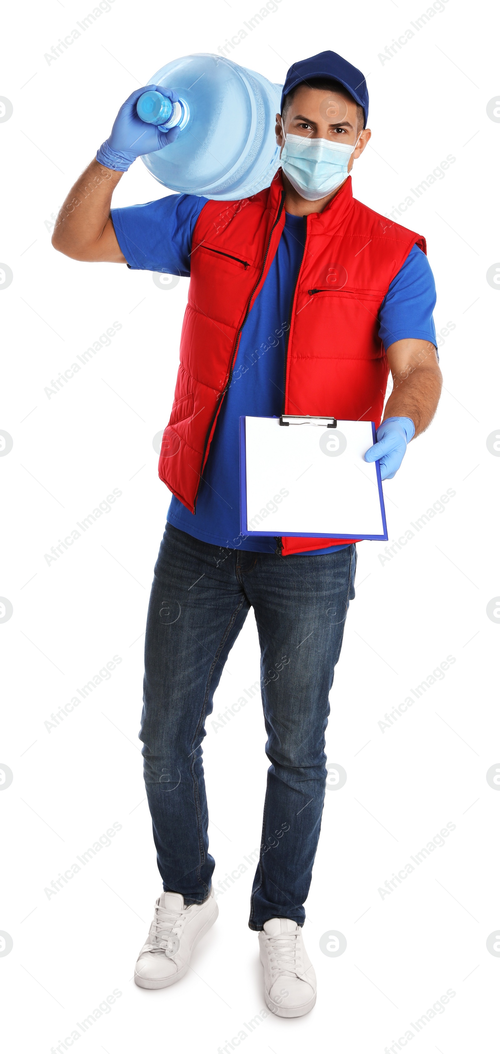 Photo of Courier in face mask with clipboard and bottle of cooler water on white background. Delivery during coronavirus quarantine