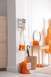 Modern hallway interior with stylish dressing table and key holder