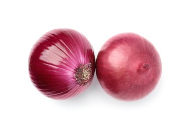 Two fresh red onions on white background, top view
