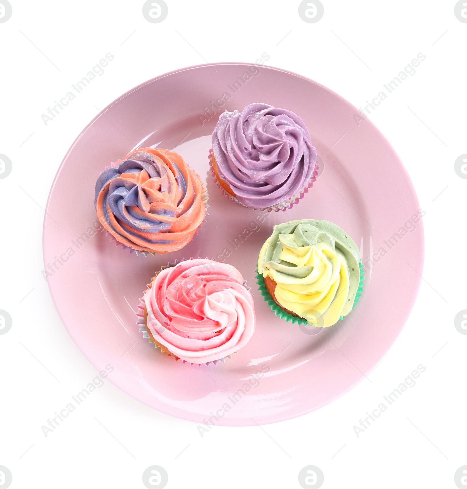 Photo of Different tasty cupcakes with cream isolated on white, top view