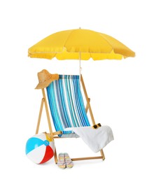Photo of Open yellow beach umbrella, deck chair, inflatable ball and accessories on white background