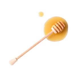 Photo of Wooden dipper and fresh honey on white background, top view