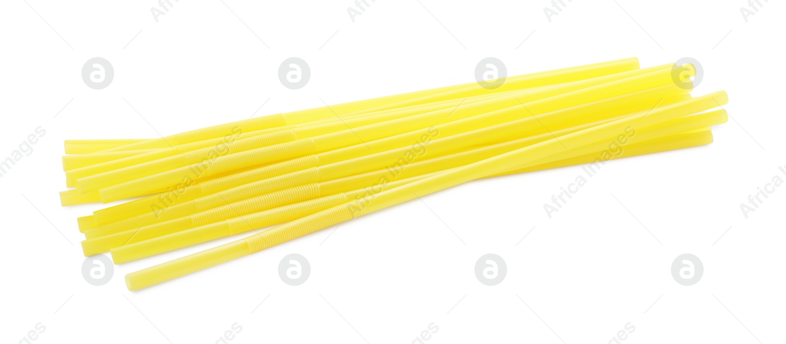 Photo of Yellow plastic cocktail straws on white background