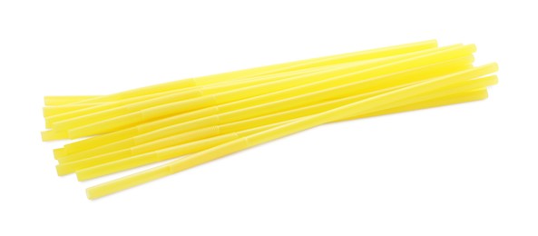 Photo of Yellow plastic cocktail straws on white background