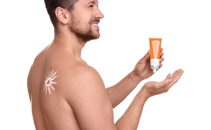 Handsome man with tube of sun protection cream on white background