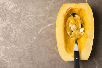 Cut spaghetti squash on gray table, top view. Space for text