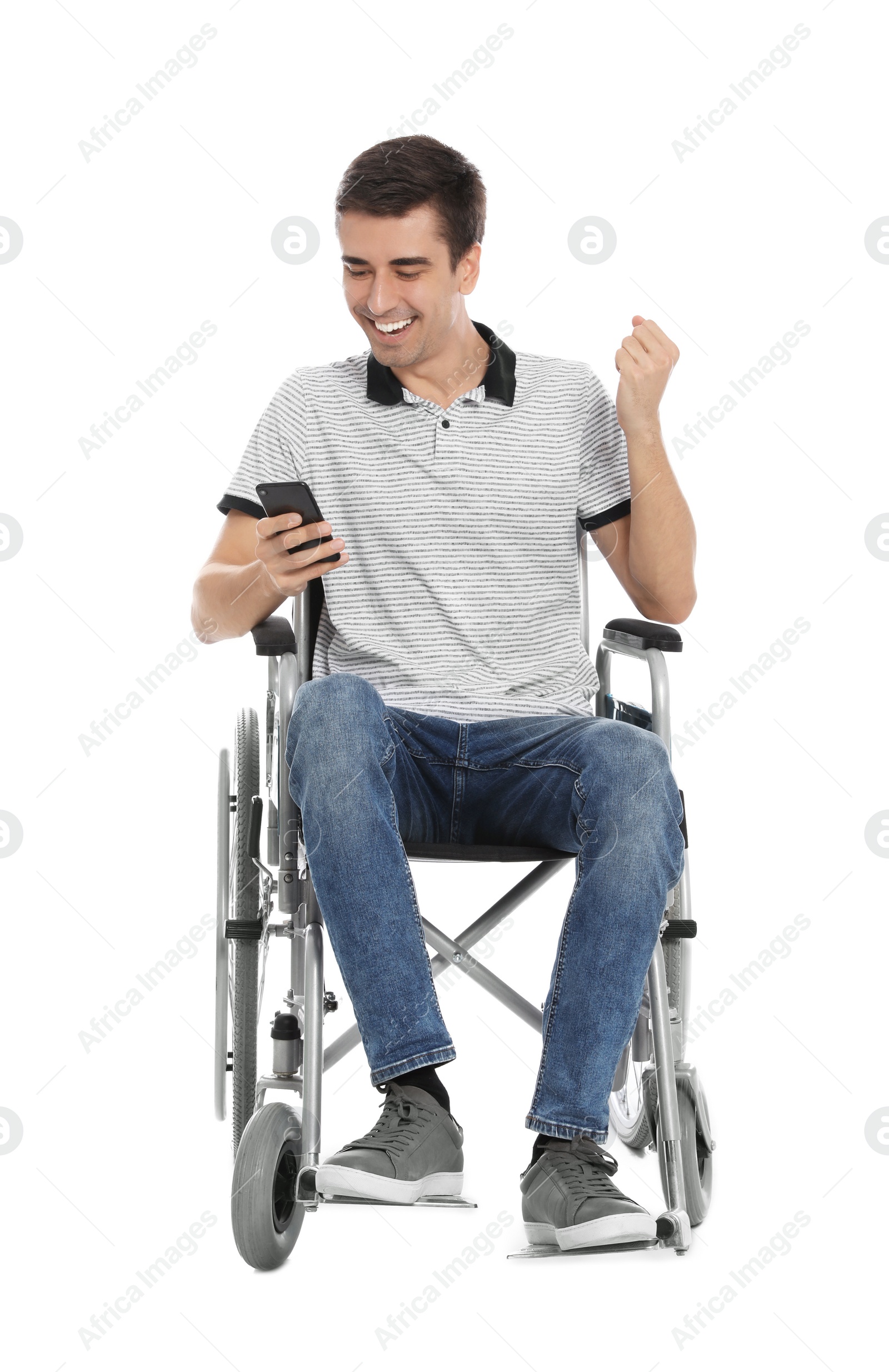 Photo of Emotional man in wheelchair using mobile phone isolated on white