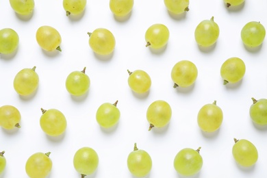 Photo of Fresh ripe juicy grapes on white background, top view