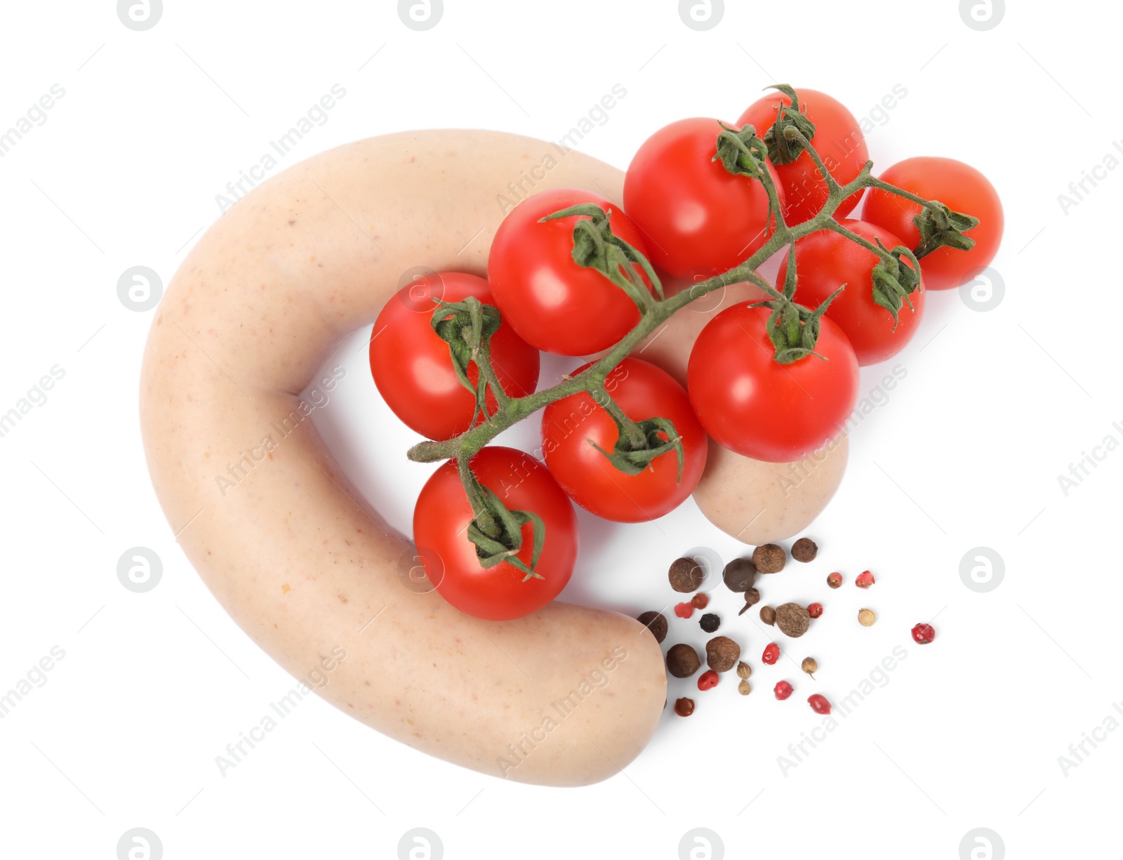 Photo of Delicious liverwurst with cherry tomatoes and spices on white background, top view