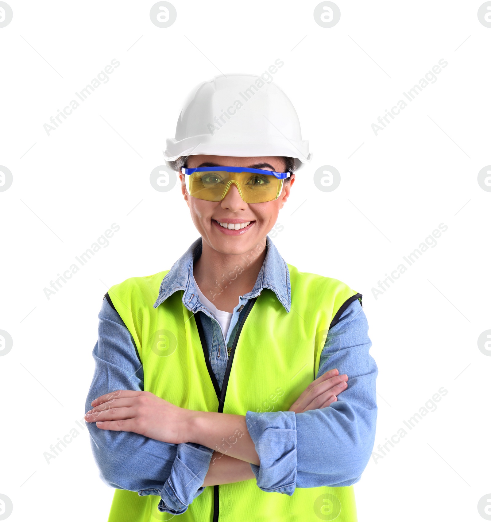 Photo of Female industrial engineer in uniform on white background. Safety equipment