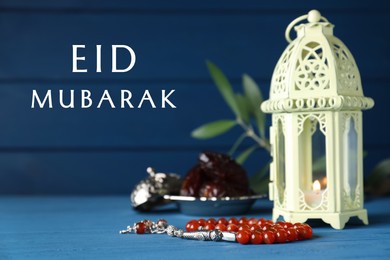 Image of Eid Mubarak greeting card. Composition with Arabic lantern and misbaha on blue wooden table