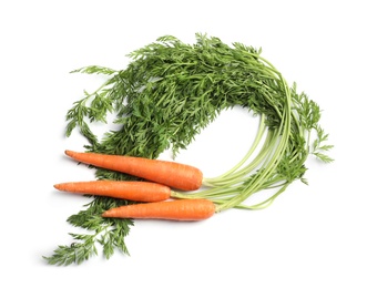 Photo of Fresh ripe carrots on white background, top view