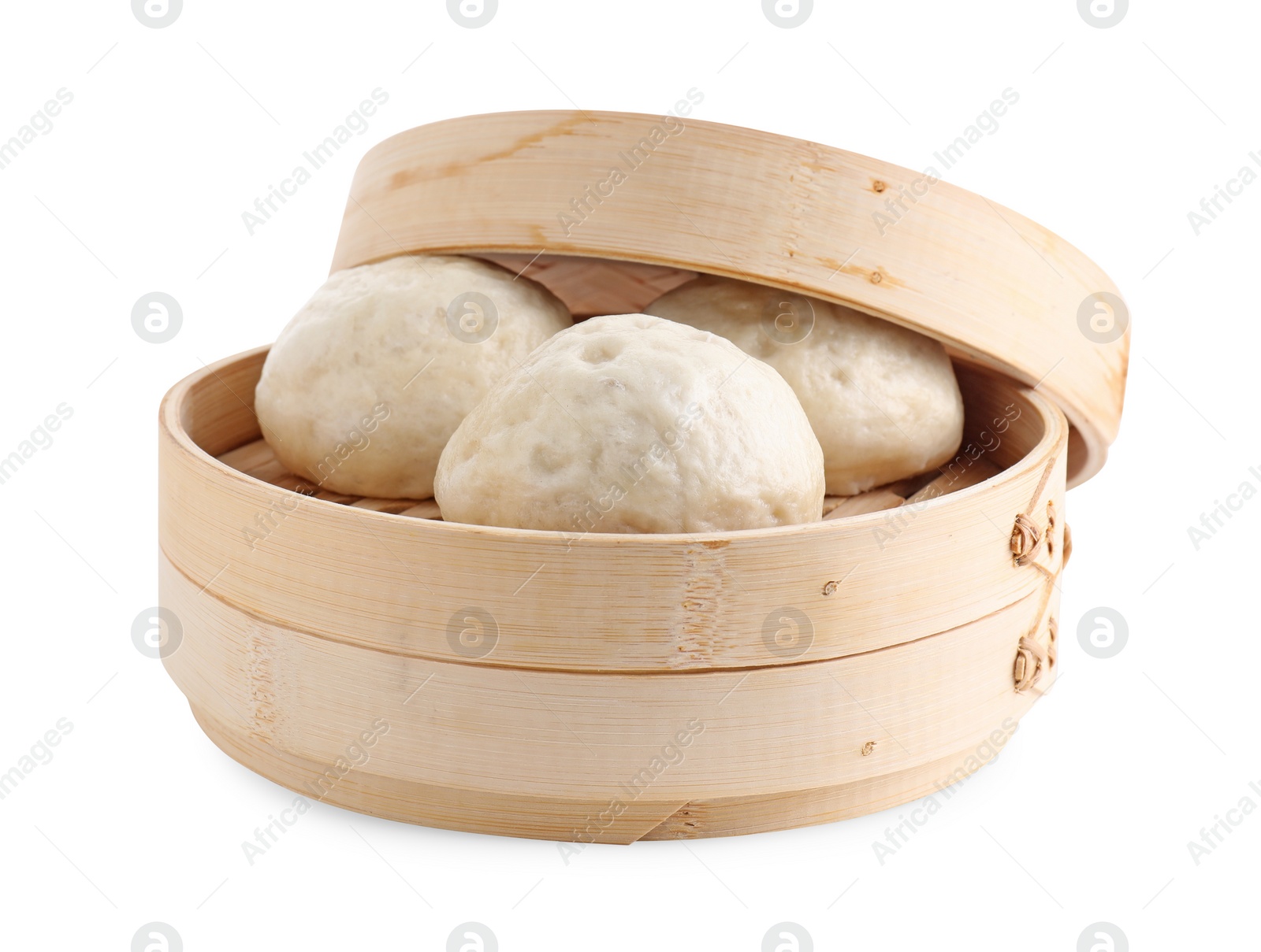 Photo of Delicious chinese steamed buns in bamboo steamer isolated on white