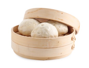 Photo of Delicious chinese steamed buns in bamboo steamer isolated on white