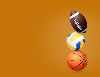 Image of Stack of different sport balls on dark orange background, space for text