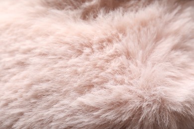 Photo of Texture of pink faux fur as background, closeup