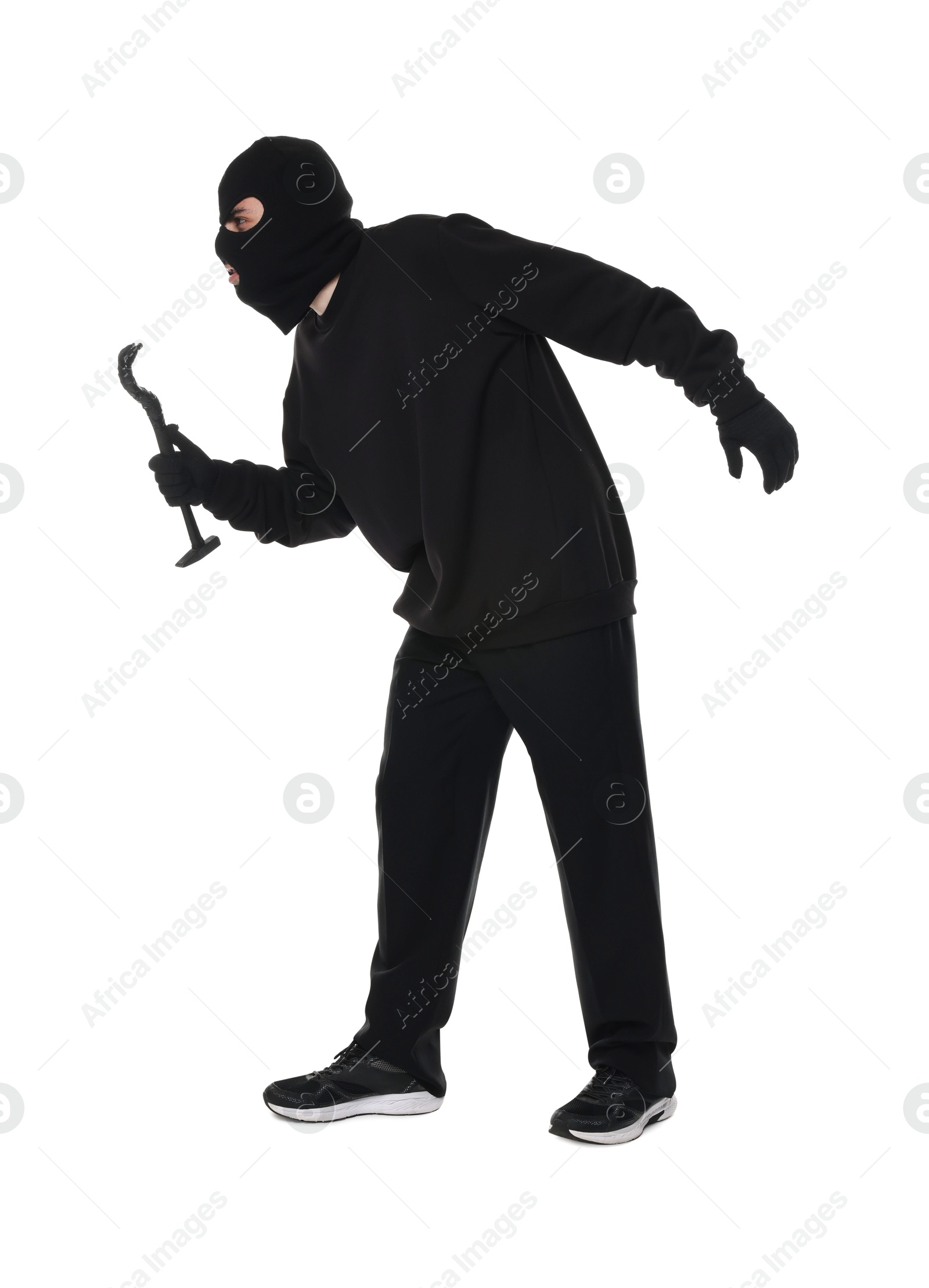 Photo of Thief in balaclava with crowbar on white background