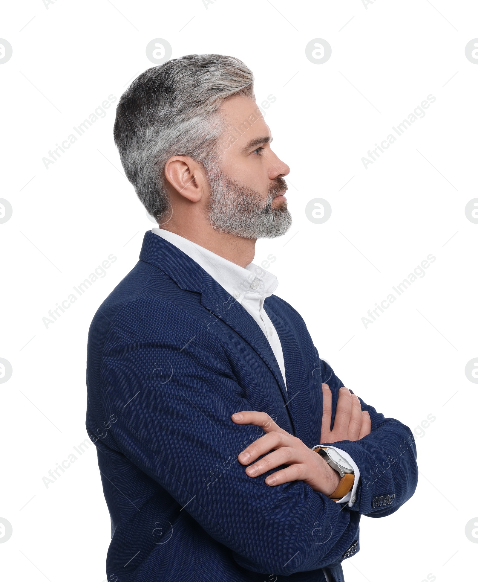 Photo of Mature businessman in stylish clothes posing on white background