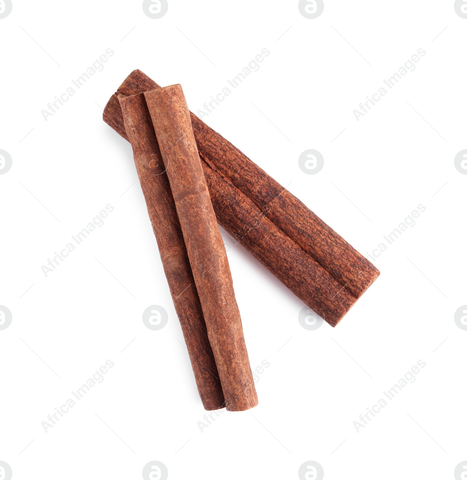 Photo of Cinnamon sticks isolated on white, top view