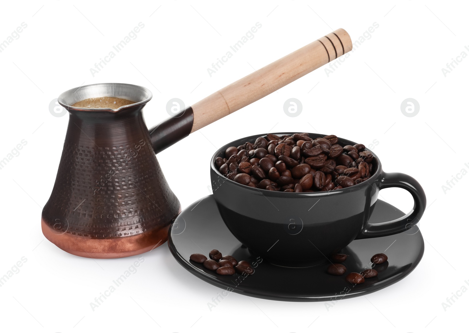 Photo of Metal turkish coffee pot with hot drink and beans on white background