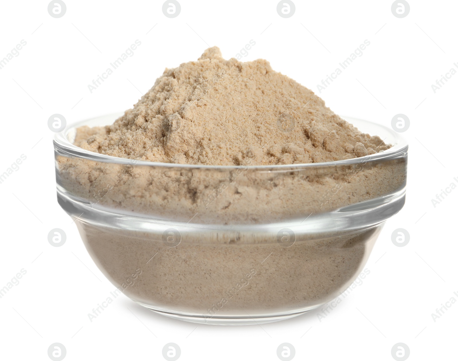 Photo of Glass bowl of buckwheat flour isolated on white