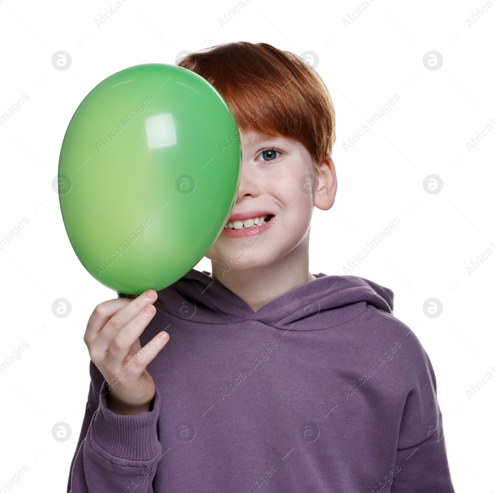 Photo of Boy with green balloon on white background