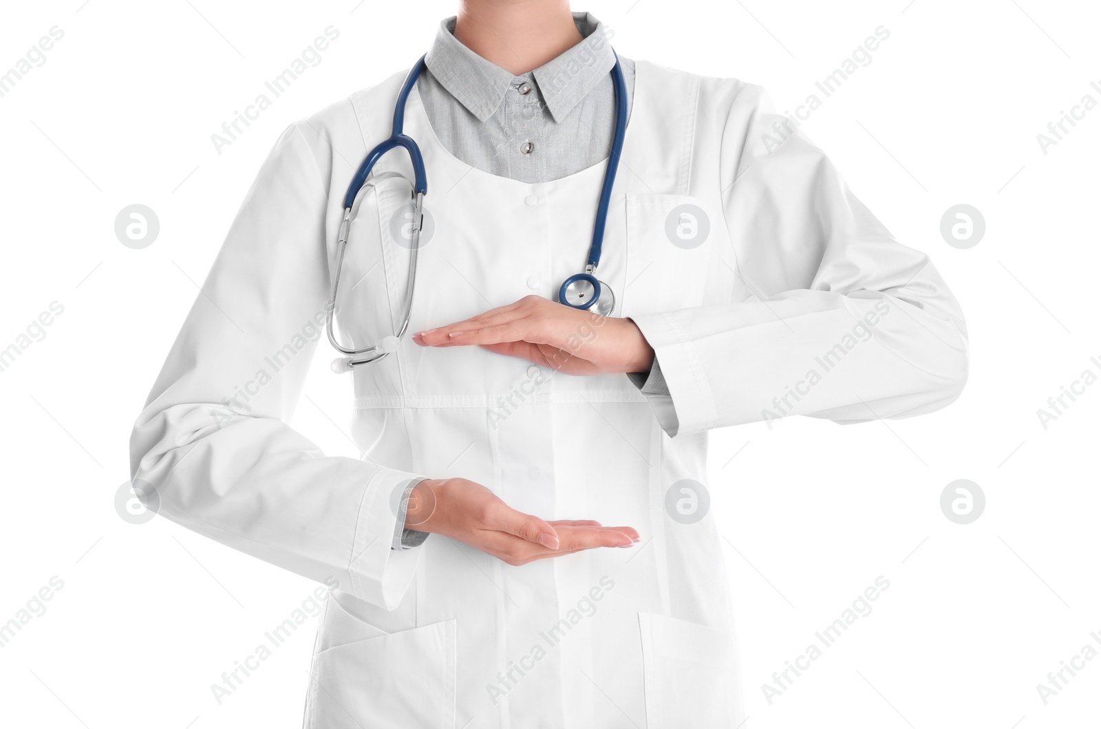 Photo of Female doctor holding something on white background, closeup