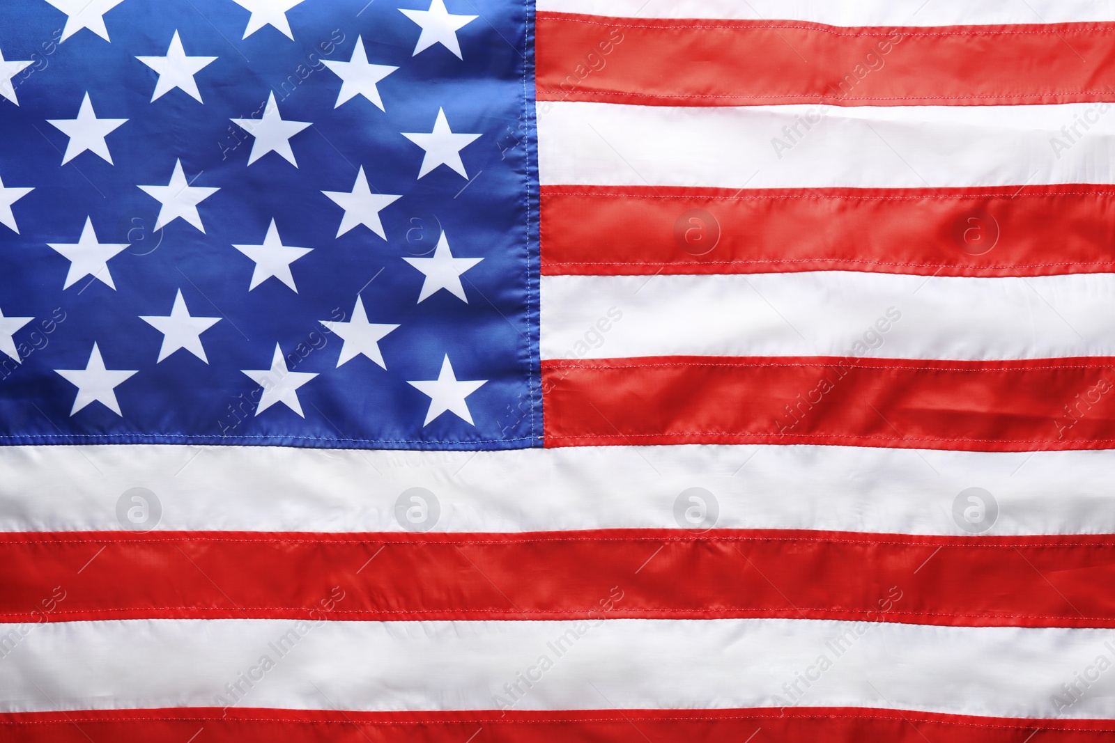 Photo of American flag as background, top view. National symbol of USA