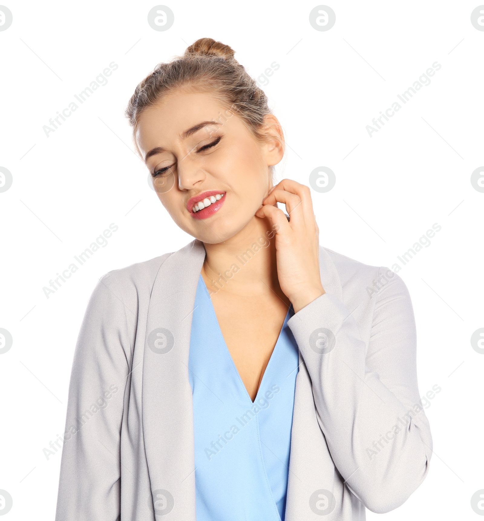 Photo of Young woman scratching neck on white background. Annoying itch