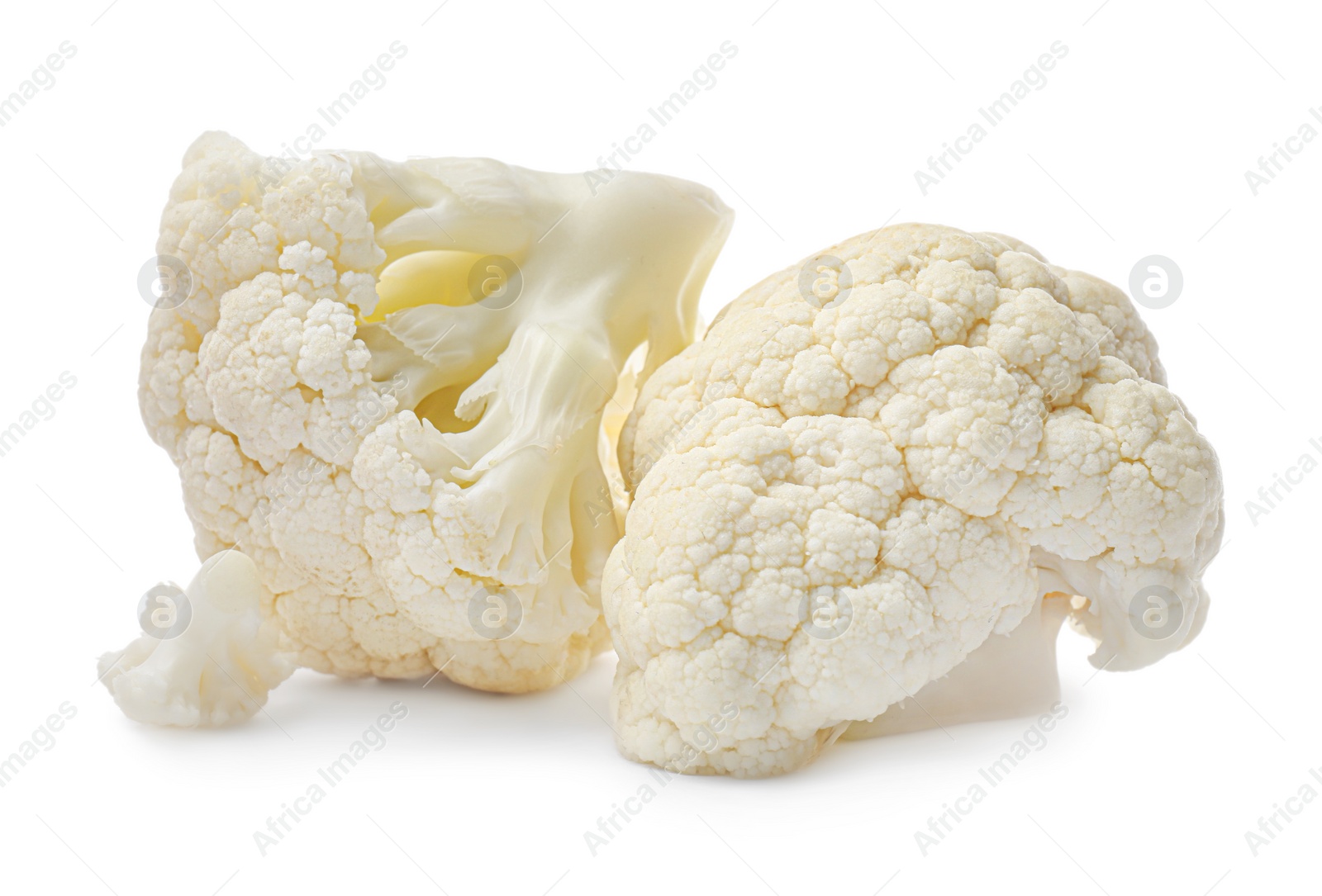 Photo of Cut fresh raw cauliflowers on white background