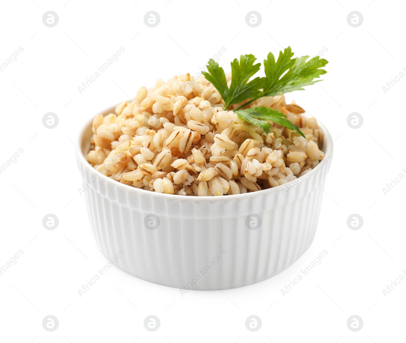 Photo of Delicious pearl barley with parsley in bowl isolated on white